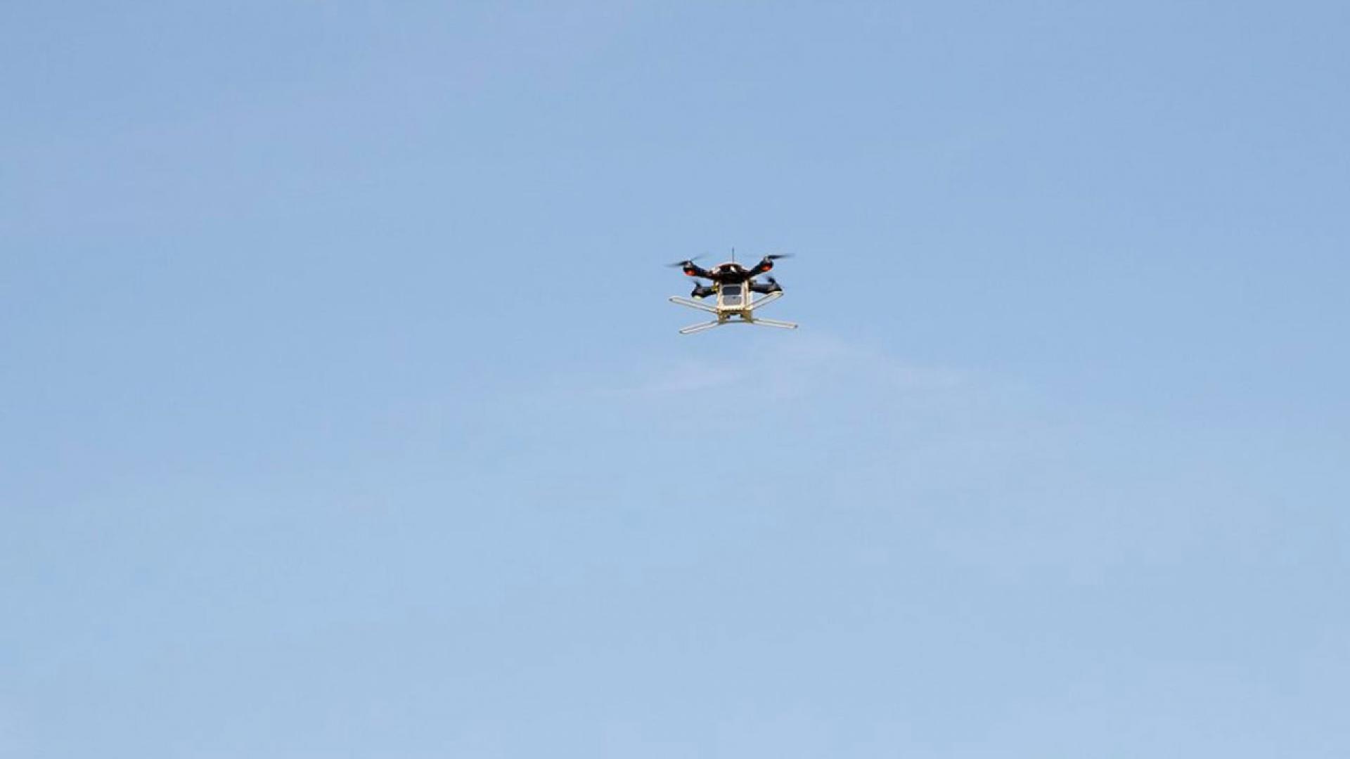Kitsat flying under a drone